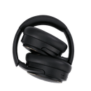 Person wearing Byte Super Comfort 40 headphones on a train using wireless Bluetooth hands-free