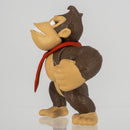 Close-up detail of Donkey Kong's face, capturing his confident, determined expression.