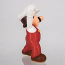 Rear view of the Fire Mario figurine illustrating the detailed 360-degree sculpt of the classic pose.
