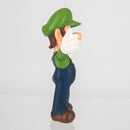 Luigi 6cm figurine held in a hand to demonstrate the palm-sized collectible scale.