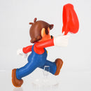 Super Mario 6cm figurine held in a hand to demonstrate the palm-sized collectible scale.
