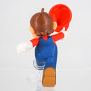 Angled view of the Ishikawa Toy Super Mario figurine highlighting the dynamic running stance.